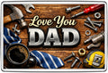 Love You Dad silver lettering, tools, coffee, striped tie on wooden workbench